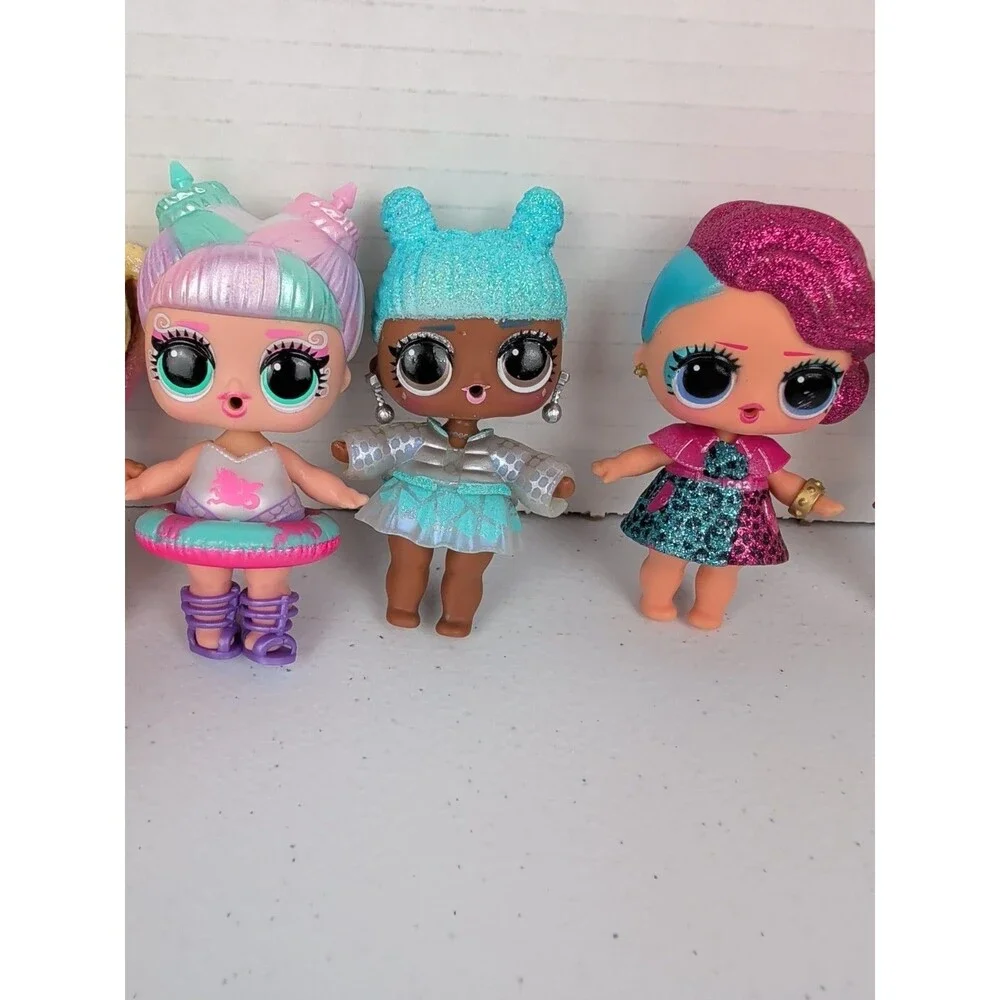 Lot of 8 LOL Surprise Dolls And Pet